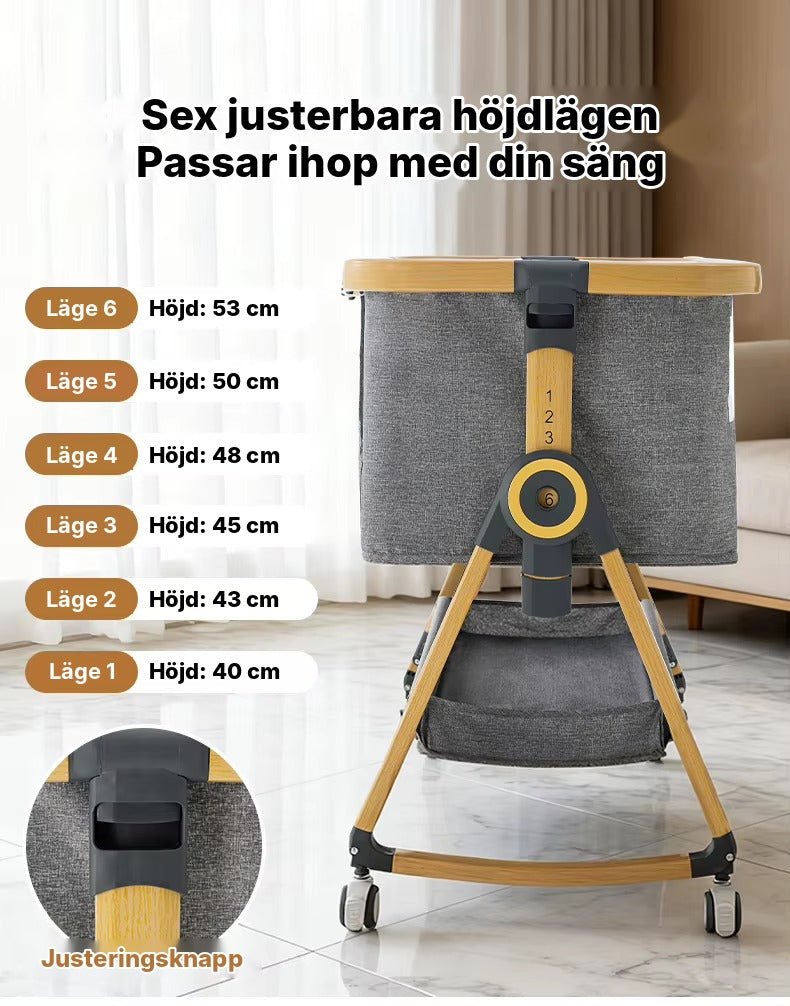 Bedside Crib Vyssa har sex höjdlägen från 40 till 53 cm som ställs in med justeringsknappen